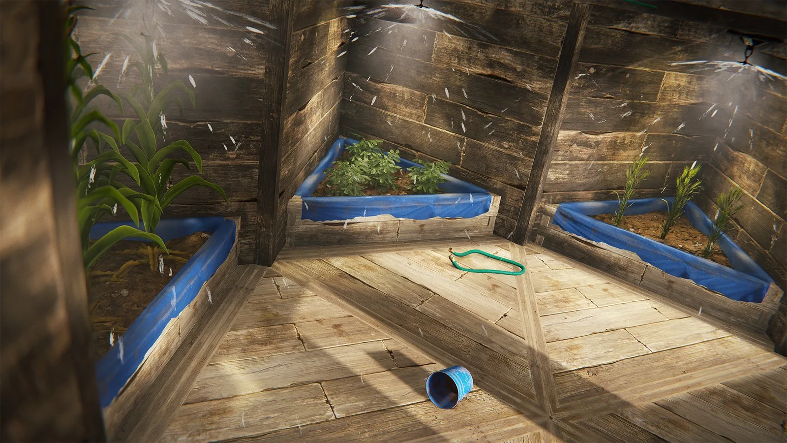 Triangle planter boxes growing crops under sprinklers