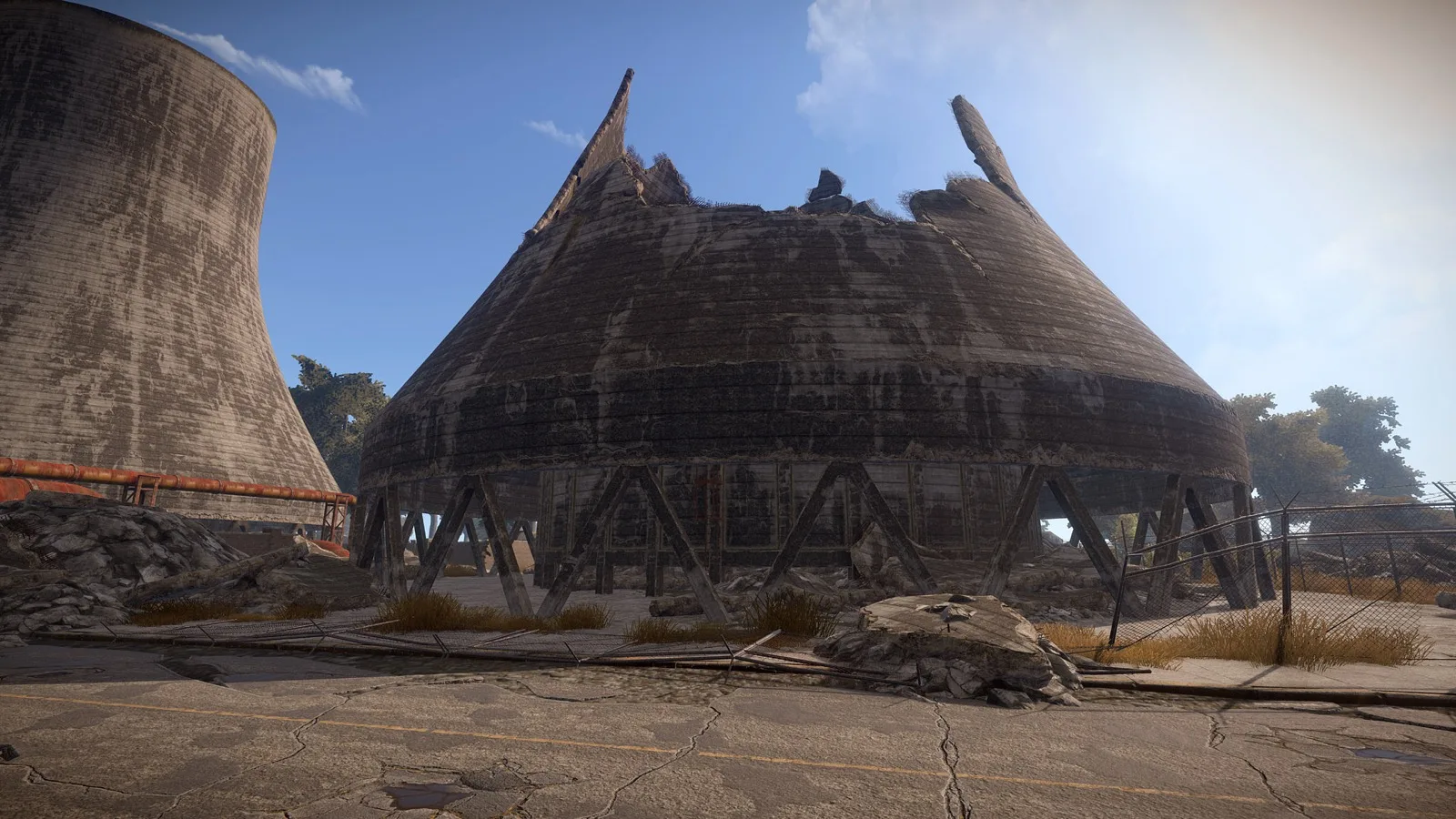 Power Plant's collapsed cooling tower standing beside its intact twin