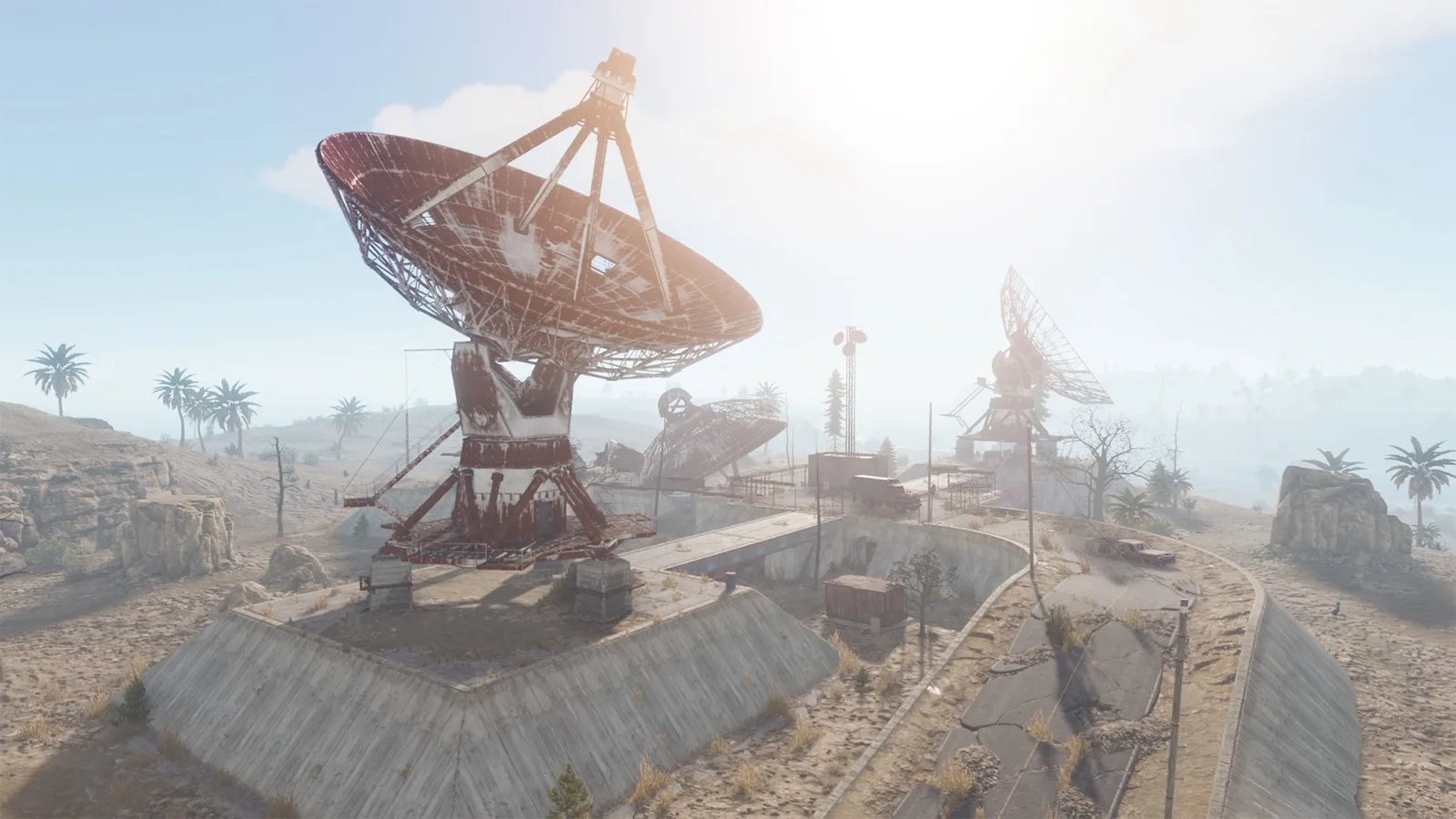 The rusting dish array at Satellite Dish under a hazy sky