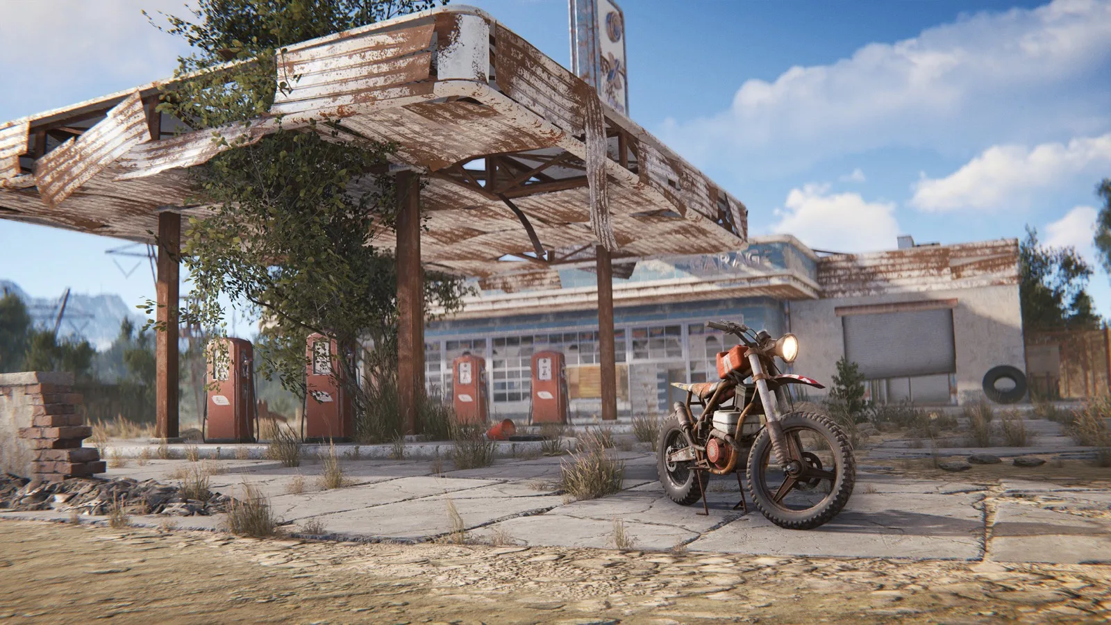 A motorbike parked outside an abandoned gas station